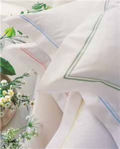 Atoll white bed sheets with 2 row trim