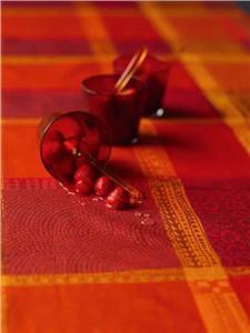 Mille Wax laminated french table linens in Ketchup